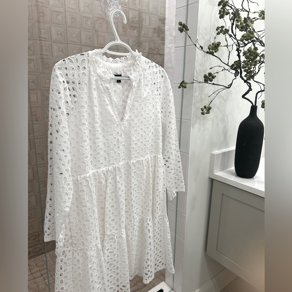 j crew small, white flowy summer frock, with cutout floral design